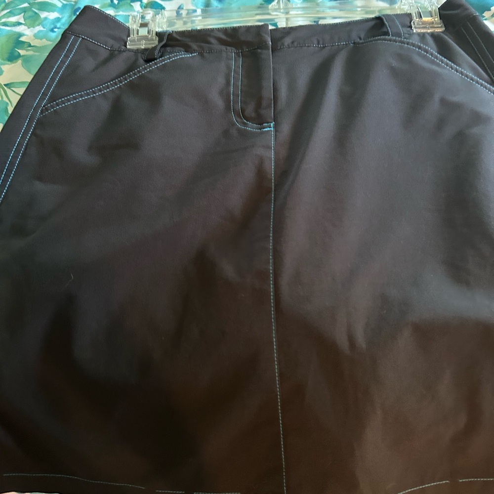 Annika Black golf Skort with Blue Stitching
